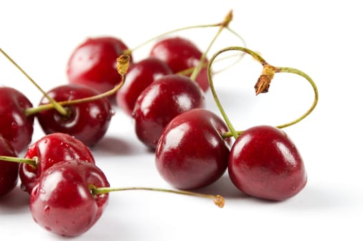 Shot of cherry berries with heart symbol