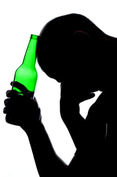 Silhouette of man drinking alcohol isolated on white background