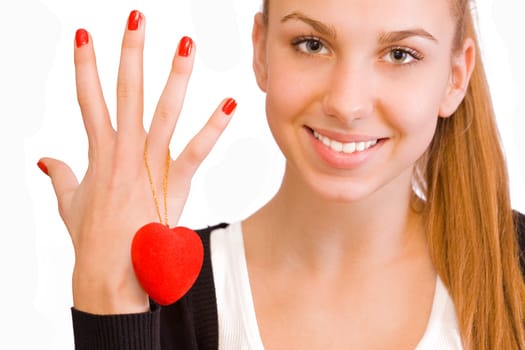 Beauty young girl with red heart toy, Valentine's Day