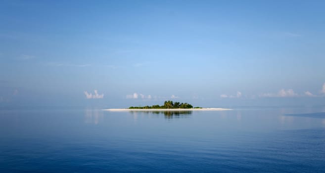 an uninhabited tropical island in t he maldives