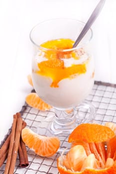 Semolina porridge tangerines dessert with cinnamon