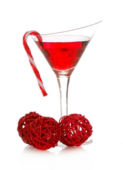 christmas cheer - colorful cocktail with candy cane on the side isolated on white background