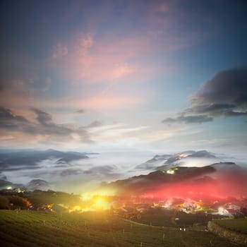 Amazing sunrise and sea of cloud with mountains