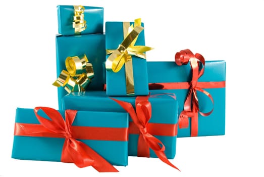 many blue presents with gold and red decorations, on white