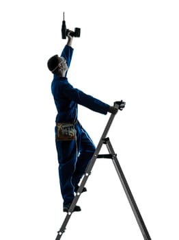 one caucasian man construction worker holding drill silhouette in studio on white background