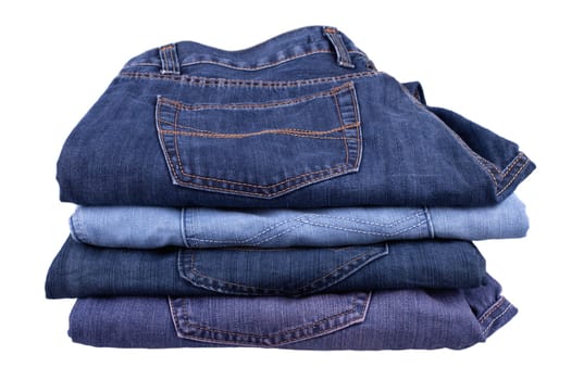 Stack of jeans isolated on white background.