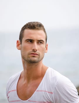 Portait of attractive and fit mediterranean looking young man