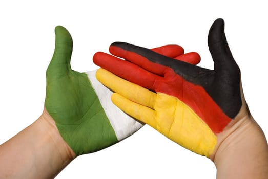 hands with german and italien flag, symbolizing international relations