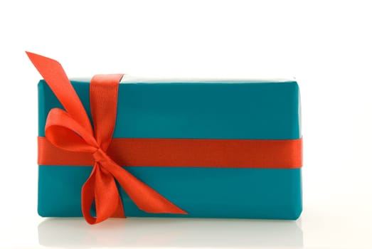 one single blue gift with red decoration, isolated