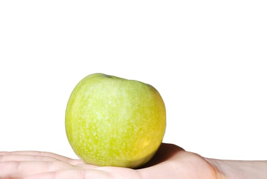 a hand holds an apple, on white