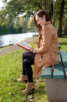 Laughing woman with book