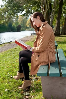 Laughing woman with book