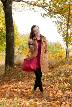 Young woman walking in the park