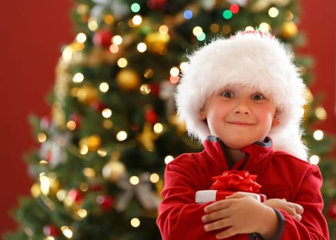 young boy with Christmas gift