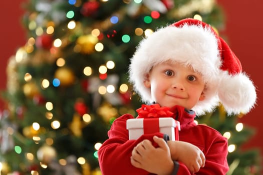 young boy with Christmas gift