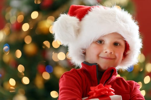 young boy with Christmas gift