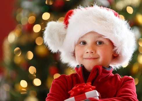 young boy with Christmas gift