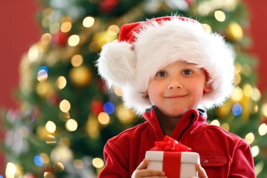 young boy with Christmas gift
