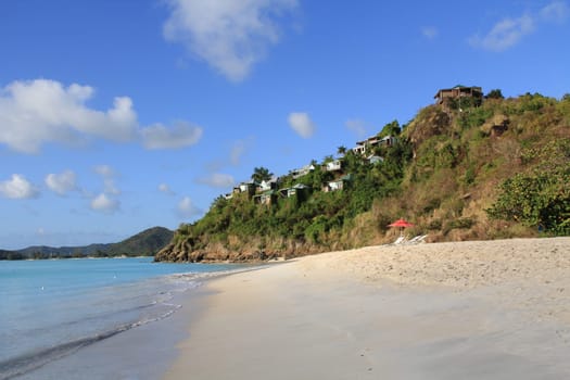Rental cottages on a hill with view of the Caribbean in Antigua Barbuda near Valley Church Beach.
