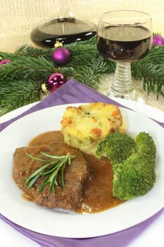 Venison steak with broccoli and potato gratin