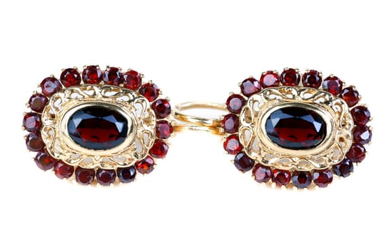 gold earrings with ruby ​​isolated on white