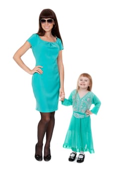 A portrait of a Glamour mother and her baby girl,  in sunglasses over white background