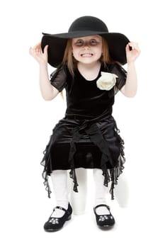 A little sweet girl felt hat is scary faces
