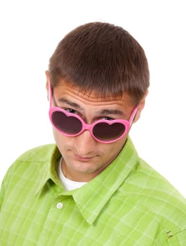 Close-up portrait of a man in pink sunglasses in a fun setting. Isolate on white.