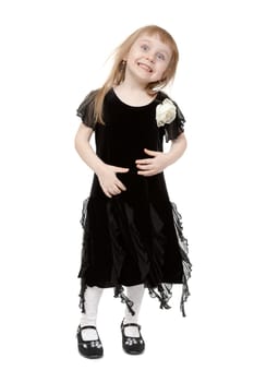 hamming little lady in the studio. Isolate on white background