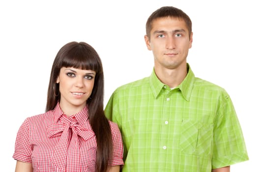 Family portrait, a beautiful young couple in colored clothing.