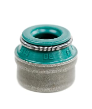A valve stem cap closeup on white background