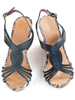 pair of women's sandals, top view on a white background