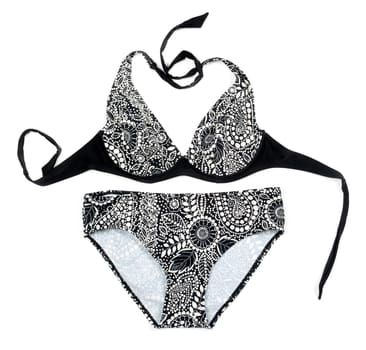 Black women's swimsuit with floral pattern. Isolated on white