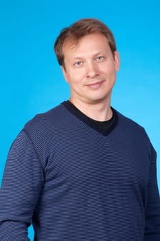 portrait of handsome man on a blue background