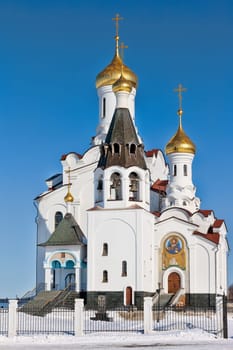 domes of the Russian Orthodox church against the blue sky background