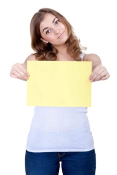 An image of young beautiful girl holding sheet of paper, isolate on white
