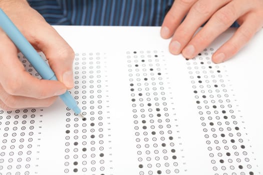 Student complete the questionnaire (filling the test form) - school exam concept and another test completing (new job interview, IQ test etc.).