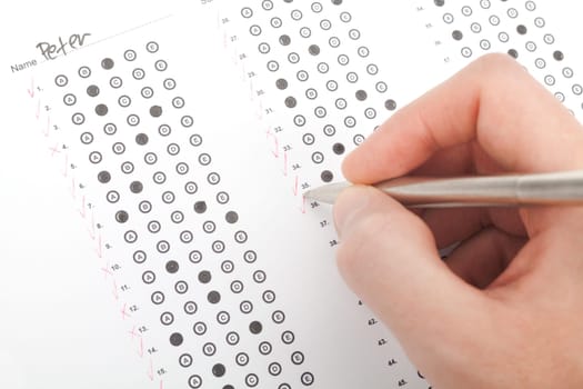 Teacher correct the test (questionnaire). Top view.