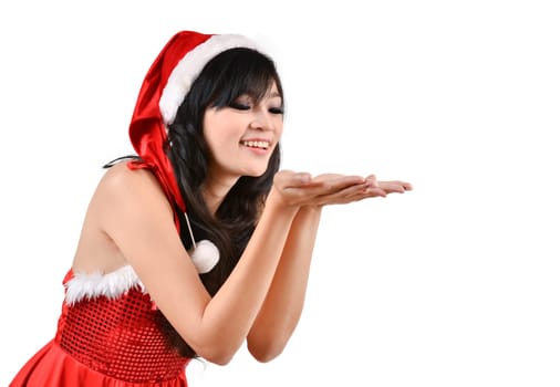 Santa woman  holding a white poster isolated a on gray background