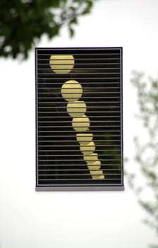 Window overlooking row of lamps