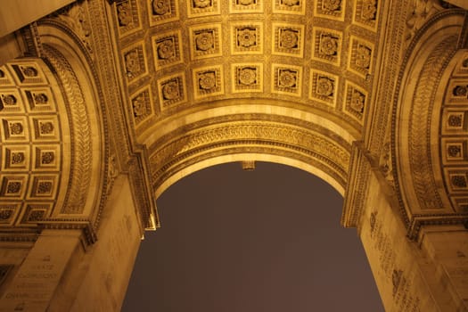 Arc de Triomphe in champs-elysees photographed in night