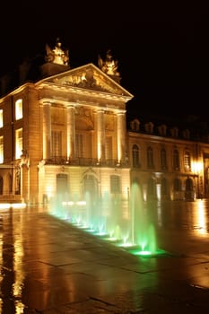 dijon government building at night after rain