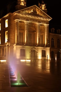 dijon government building at night after rain