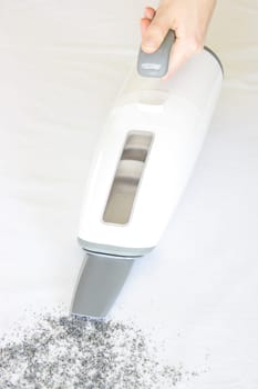 electrical vacuum cleaner on isolated white background