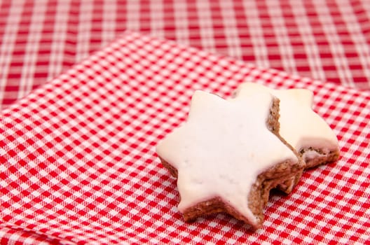 Christmas brooks cinnamon stars on a red and white checkered cloth
