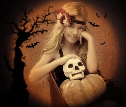 halloween kid girl with pumpkin and skull smiling on vintage background