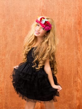 black dress kid girl dancing and on retro vintage background