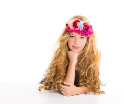 children fashion blond girl with spring flowers on head over white