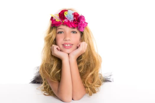 children fashion blond girl with spring flowers on head over white