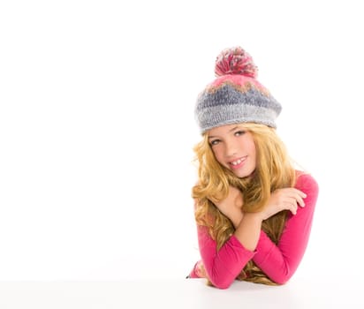 Kid girl with winter wool cap happy smiling on white background